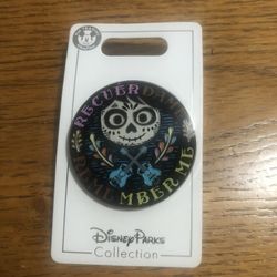 Disney Parks Trading pin Pixar Coco Recuerdame Remember Me.  Size 1 3/4 inches Wide .  Brand New On Original Card .  Has been on display in a cabinet 