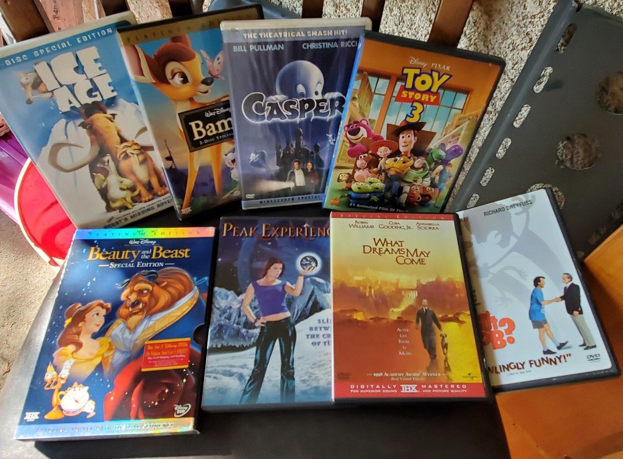 8 movies DVD, IGE AGE,Bambi, Gaspar,TOY story,Beauty and beast, That dreams May come, peak experience,