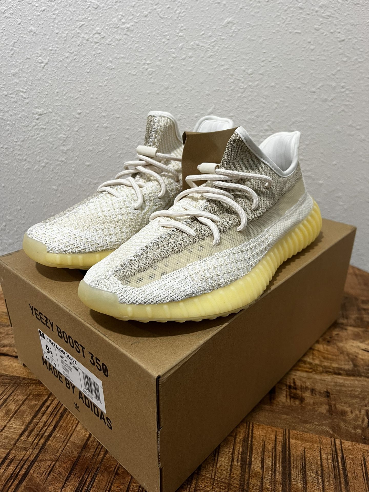 yeezy boost 350 v2 cream white box adidas  Hidden Realm the luminous colored Yeezy Boost 350 has a cream white upper adidas Yeezy Boost 350 V2