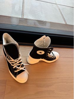 Converse high heel Chuck Taylor’s. Women’s 8