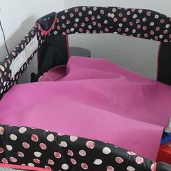 Disney  Baby Play Yard with Bassinet and Toy Bar,