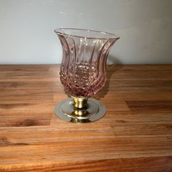 This is a Homco votive candle holder featuring the "Plum Cathedral Diamond" pattern and a brass base.