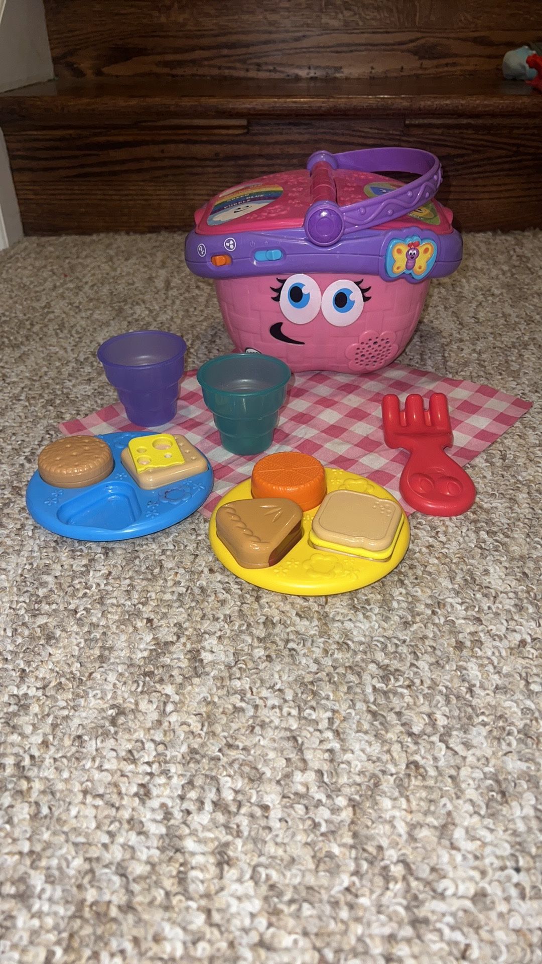 LeapFrog Shapes and Sharing Picnic Basket (Pink) works great talks with music. Missing watermelon & 1 fork. 1 plate has marker on it. Table cloth has