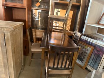 Small table with four chairs