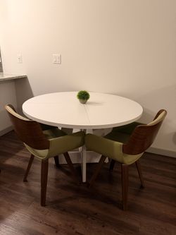 Brand New Dining Room Table With 2 Swivel Chairs.