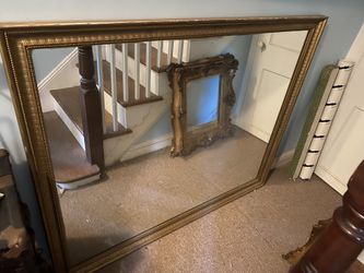 Large mirror and gold frame