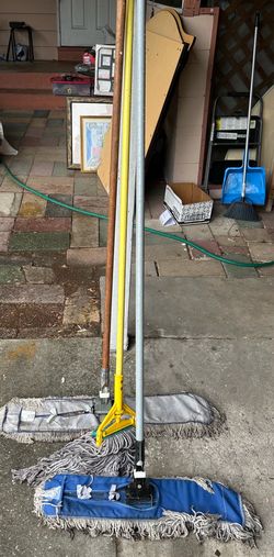 2 push brooms and 1 mop
