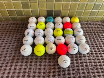 31 used golf balls mixed