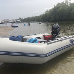 Outboard And Inflatable  Boat And  Mercury Motor 