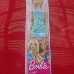 Barbie Doll in Blue Barbie Logo Print Dress. 