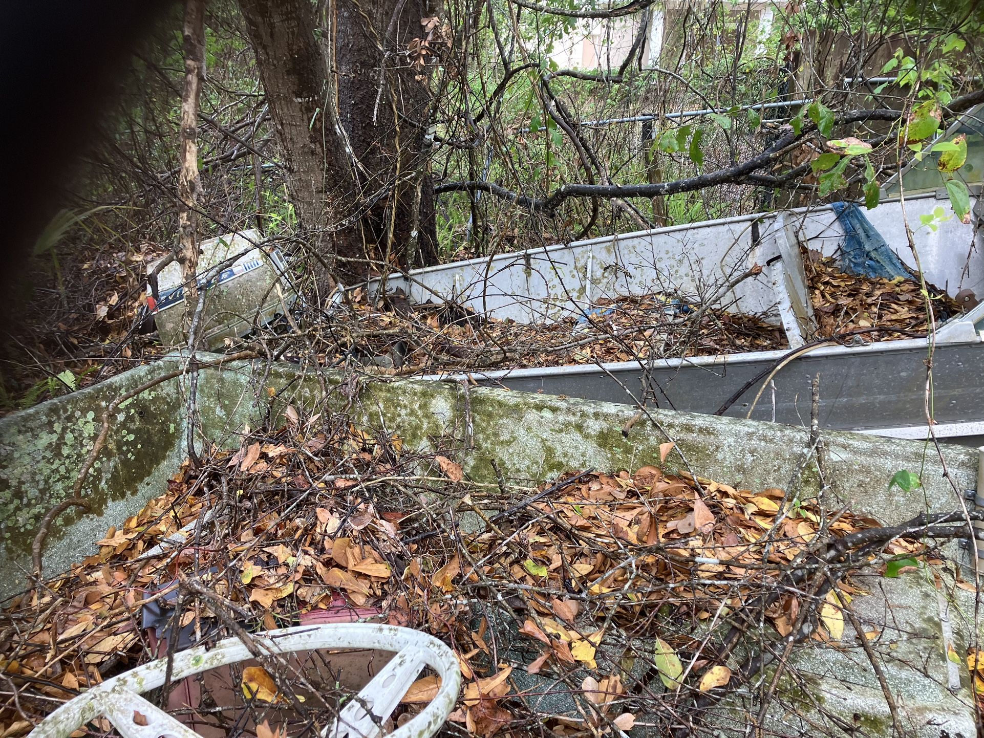 Abandoned Boats left on property must go make offer