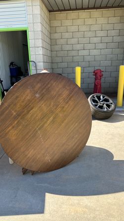 Round wood dining table