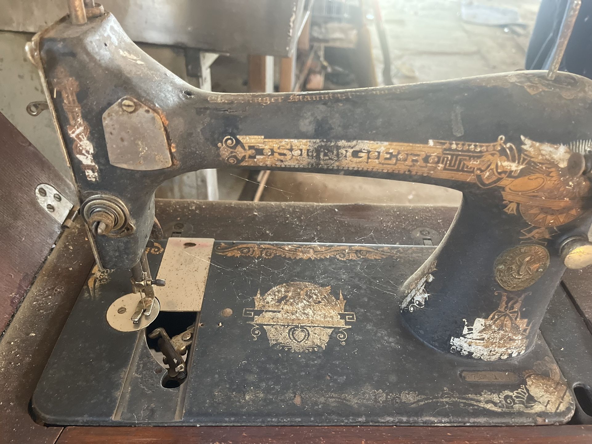 Singer, sewing machine and take