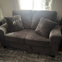 Gray sofa and loveseat