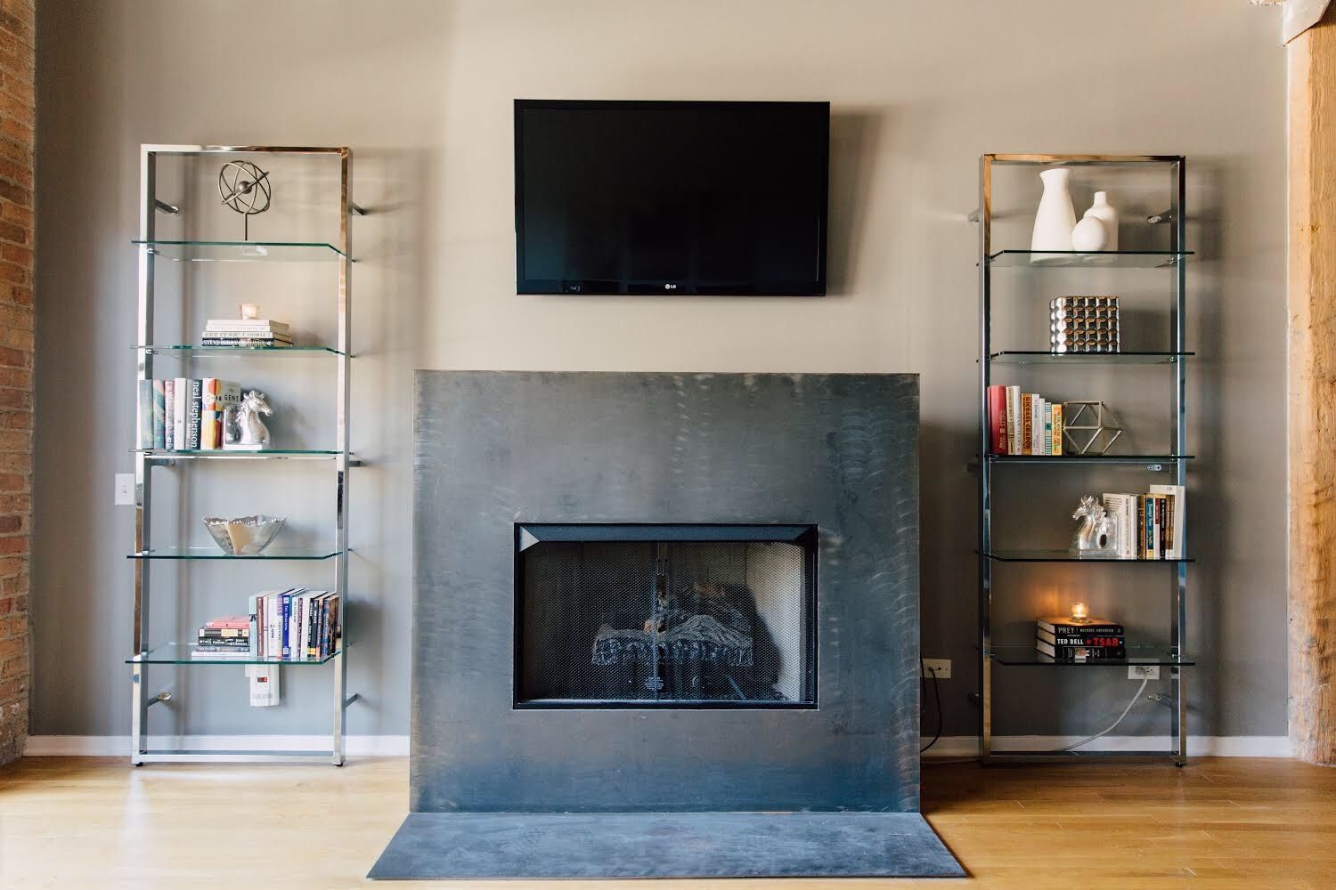 CB2 - tesso chrome 84” wall mounted bookcase (2 avail)