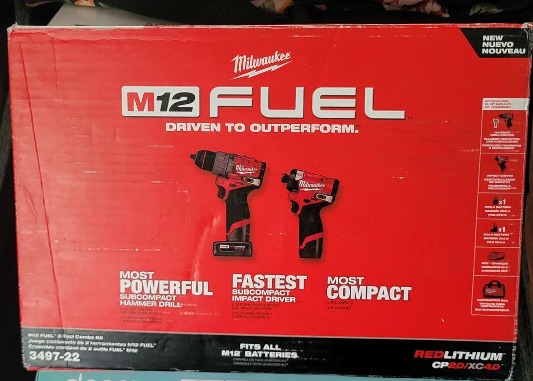 Milwaukee Fuel M12 Brushless Hammer Drill And Impact Drill With 2 High Output Batteries, Charger And Bag NEW