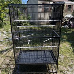 Large Bird Cage Excellent Condition (31” W x 20” ½ D x 52 ½ H) $90 FIRM ON PRICE