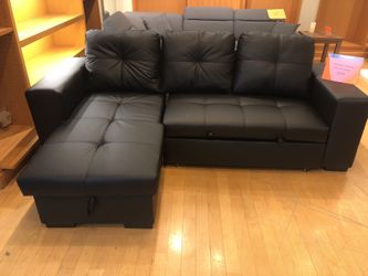 Black leather sectional with storage