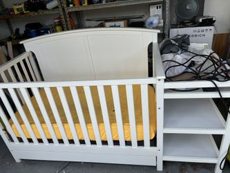 baby crib with shelves
