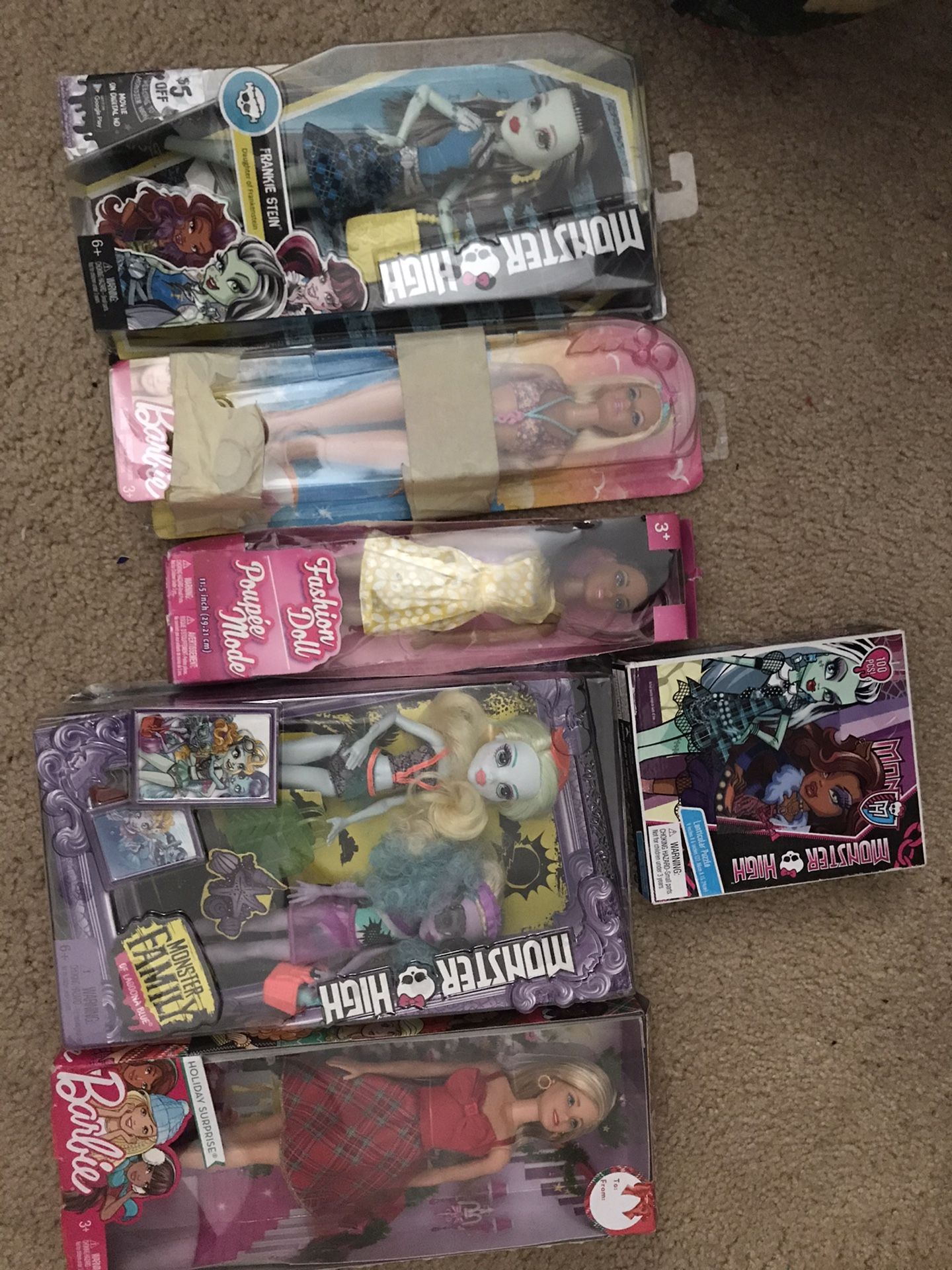 Monster high and Barbie dolls