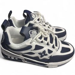 Navy and white Louis Vuitton trainers worn once the dirt is easily washed will ship 1-2 days