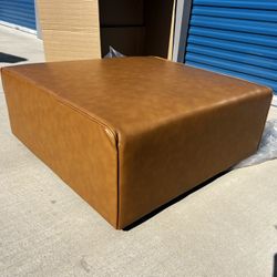 Brand New. Modern Vegan leather Ottoman. $199