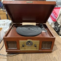 Record player (also plays cassettes/cds/radio/aux hookup)