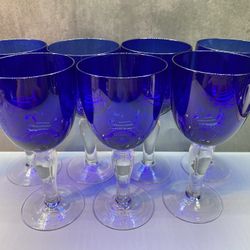 Set of (7) Gorgeous Cobalt Blue 7.5" tall Goblets Clear Stem. Hand blown. Great Condition. Manufacture unknown. 