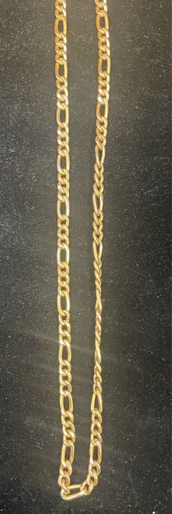 14k gold 21in Figaro chain with a lobster clasp