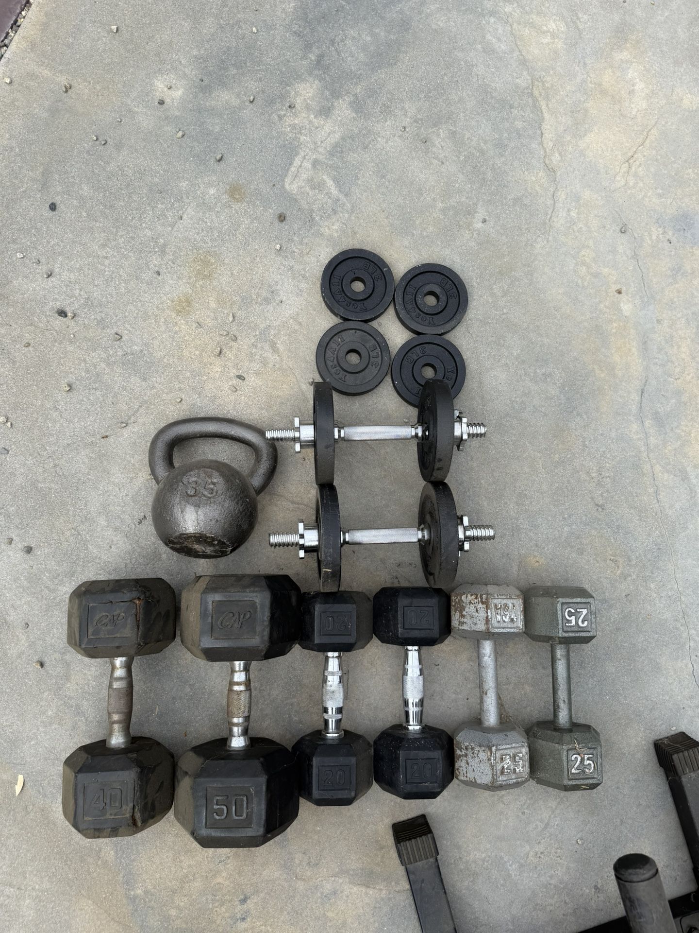 Variety Of Weights (Dumbbells , Kettlebell, And Plates)