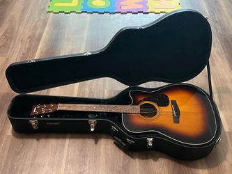 Acoustic guitar with case and accessory