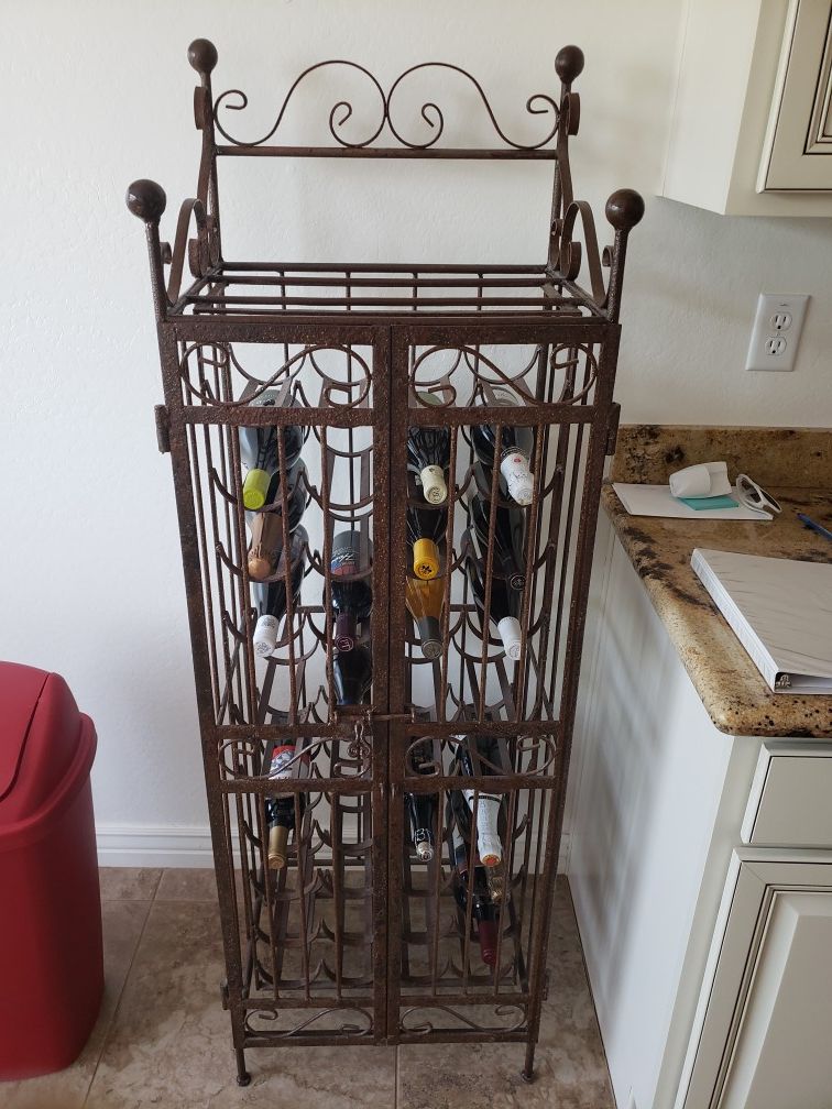Rod iron wine rack. Sturdy and heavy