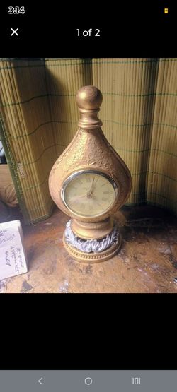 Vintage Richard Ward mantle clock. Renaissance style
