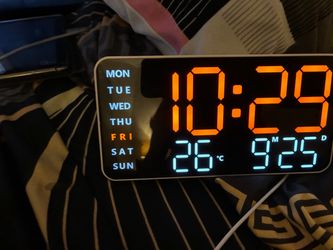 Digital clock timtemperature, date, and day of the week