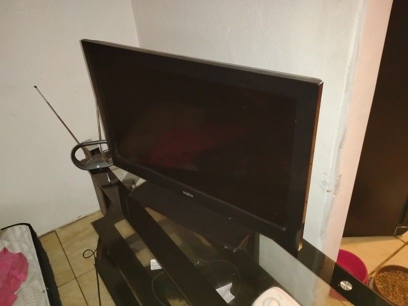 TV with an antenna and universal remote
