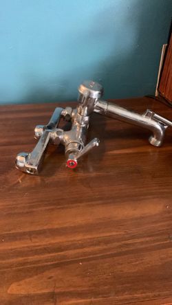 Utility wall faucet
