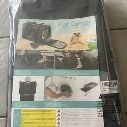 New pet carrier for travel. Suitable for small dogs and cats. 