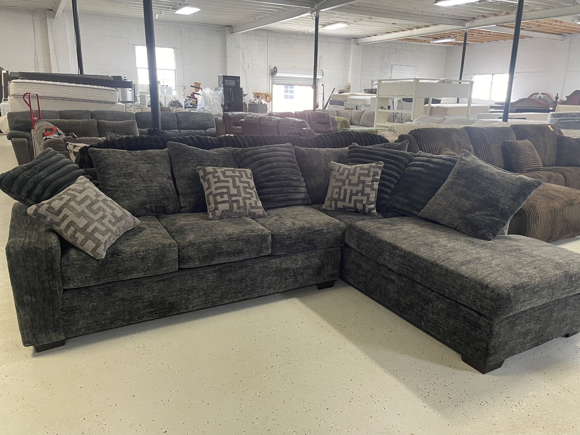 New sectional 118” by 88” $1299