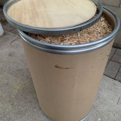 Cardboard Barrel With Lid And Wood Shavings For Animal Bedding