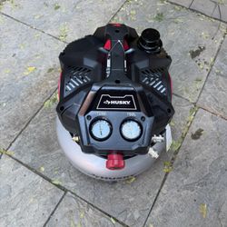 6 Gal. 150 PSI Portable Electric Oil-Free Quiet Jobsite Pancake Air Compressor with Aluminum Tank and 2-Quick Couplers by Husky