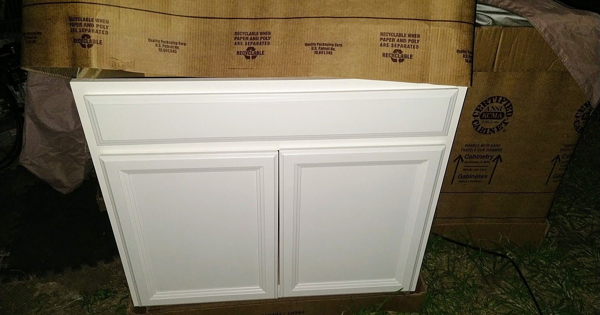 New white shaker style hardwood cabinets