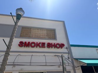 Large neon Smoke Shop sign for business