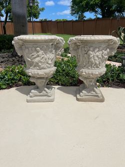 Pair of Greek concrete planter urns
