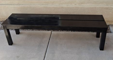 Black wooden bench