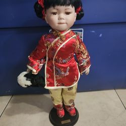 Luci Asian Porcelain Doll