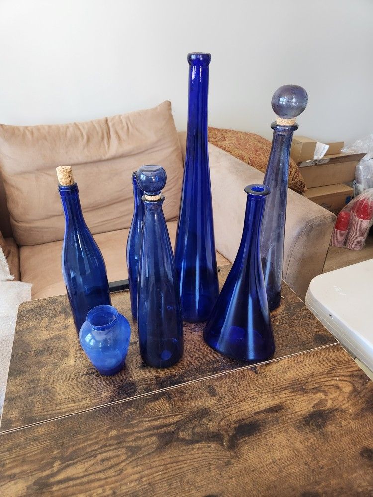 Blue Glass Bottles And Vase