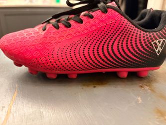 Girls soccer cleats and shin guards