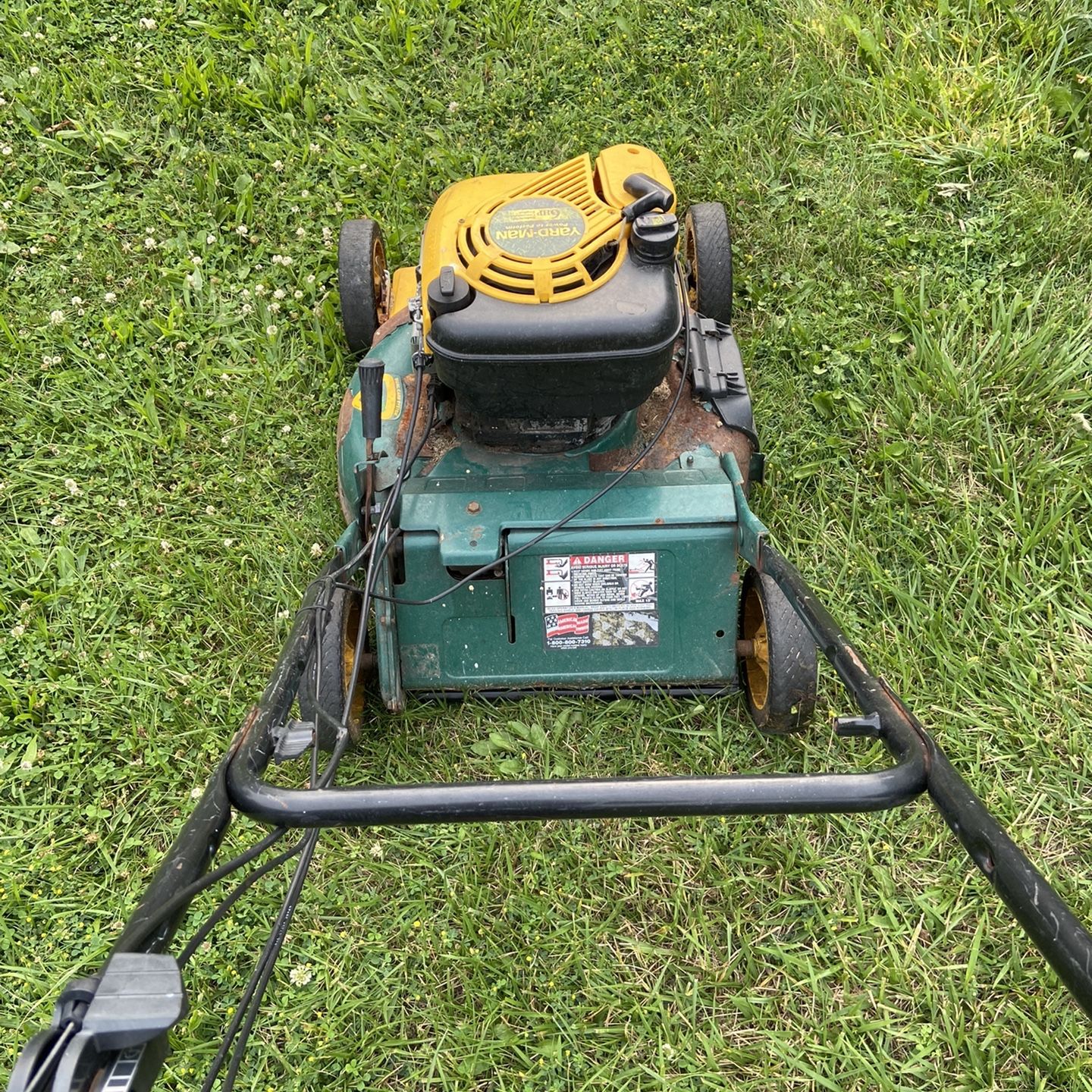 yellow yard man self propelled mower