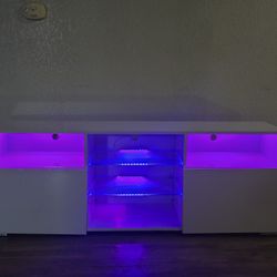 Entertainment system LED lights with, cabinets.