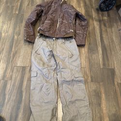 Women medium RIDE brand snowboarding suit in Peoria
